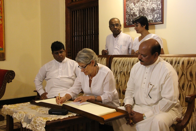 Director -General of UNESCO signing the visitor's book at Kandy Dalada Maligawa.jpg